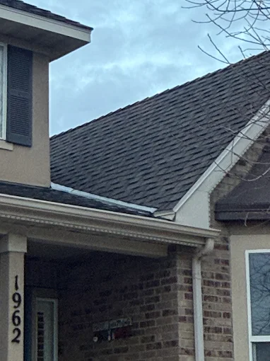 Completed roof repair and inspection on a 1960s Utah home with new asphalt shingles
